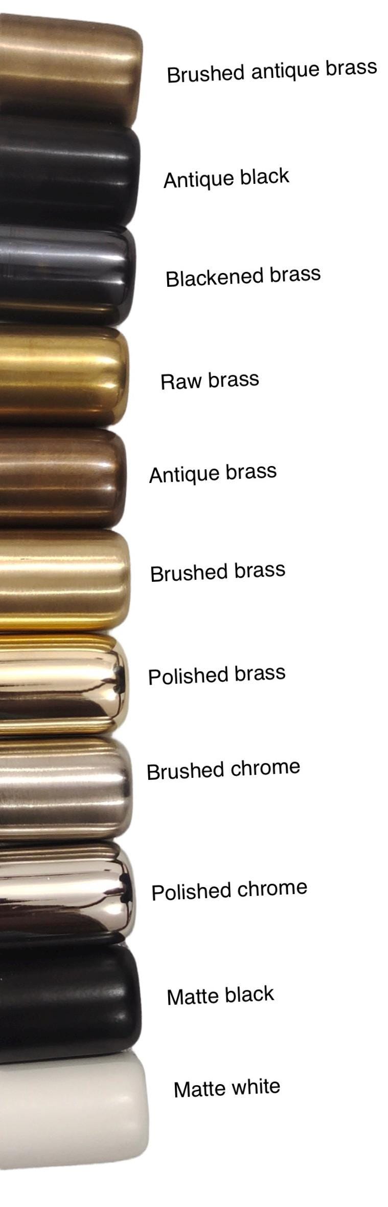 a bunch of different types of pens sitting on top of each other
